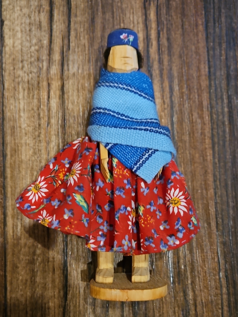 hand-carved wooden Tarahumara doll from Mexico